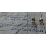 A pair of 18ct diamond ear studs ( with original receipt dated 1983 for £850).