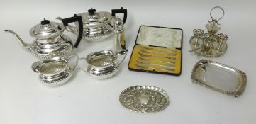 A large collection of silver plated wares including tea set, flat ware, egg cruet, trays, sugar