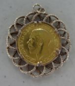 A George VI gold sovereign, set in 9ct mount.