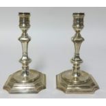 A pair of modern silver candlesticks, approx 19.30oz.
