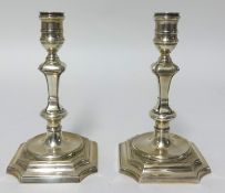 A pair of modern silver candlesticks, approx 19.30oz.