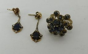 A 14ct dress ring set with a sapphire together with a pair of sapphire and diamond set drop pendant