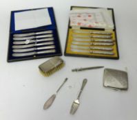A collection including cased set of six George V silver handle knives, London 1934, case set of