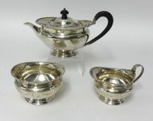 George V three piece silver tea set, Sheffield 1912, H Atkins approx 25oz.