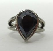 A large black diamond ring. Approx 5.00 carats, set in white gold