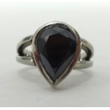 A large black diamond ring. Approx 5.00 carats, set in white gold
