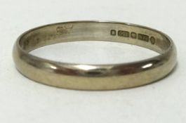A 18ct white gold wedding band, approx 2.2gms, ring size R