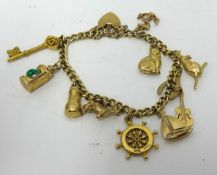 A 9ct gold charm bracelet approx 26.2gms.