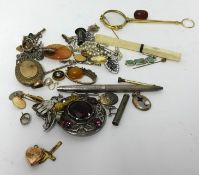 Various jewellery and objects including Scottish brooches, lockets, silver pens, clip on earrings,