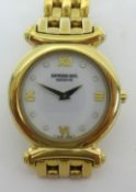 Raymond Weil, a ladies gilt and diamond style dot dial, wristwatch, with paperwork.