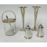 A pair of silver and wrythen bud vases, silver pepper and salt and a silver and glass jam pot,