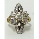 A yellow gold diamond cluster ring, the stylish setting with round and baguette cut diamonds, ring
