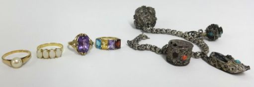 Collection of dress rings approx 10.8gms including silver charm bracelet.