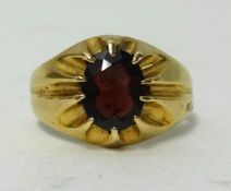 A 9ct gold garnet set ring, approx 4.4gms, ring size P1/2