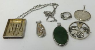 A contemporary silver block pendant and chain, carved opal pendant and other items including
