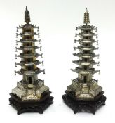 A pair of Chinese silver Pagoda’s possibly by Wang Hing & Company, early 20th century; each composed