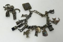 A silver charm bracelet approx 73.40gms.