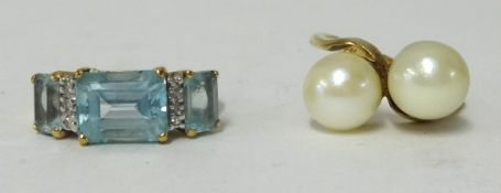 A 9ct dress ring set with blue stone and a 9ct twin pearl dress ring (2).