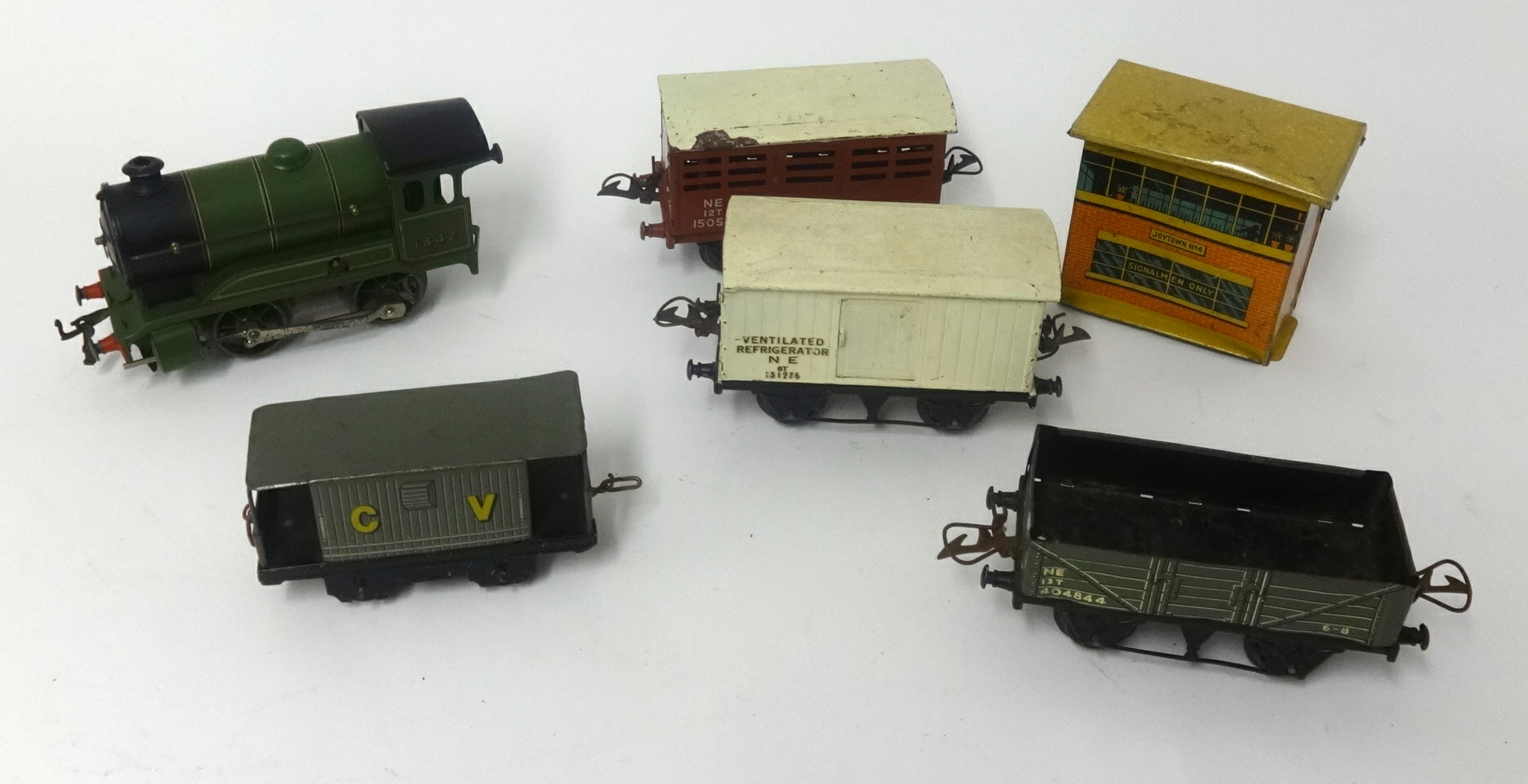 Hornby, tin plate and clockwork various model railways, tracks, wagons etc in old wood box.