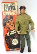 An Action Man Commando figure (talking) together with various accessories and clothing.