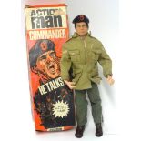 An Action Man Commando figure (talking) together with various accessories and clothing.