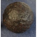 An original cannon ball 25 pounder, reputedly discovered at Fort Charles, Salcombe.