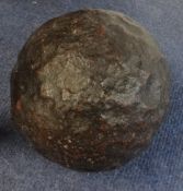 An original cannon ball 25 pounder, reputedly discovered at Fort Charles, Salcombe.
