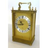 London Clock Company, a quartz movement brass cased mantel clock, height 29cm overall.