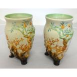 Clarice Cliff, a pair of vases with embossed Indian tree decoration, height 20cm.