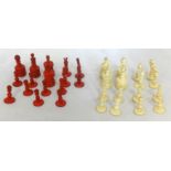 A 19th Century Chinese carved ivory red and white chess set, height of King 7cm.