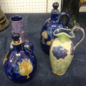 Three Royal Doulton art pottery jugs and a vase (4)