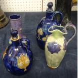 Three Royal Doulton art pottery jugs and a vase (4)