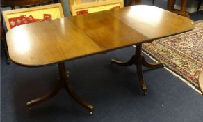 Mahogany twin pedestal dining table, length 182cm with leaf
