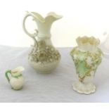 Belleek, modern porcelain jug encrusted with flowers, together with a miniature jug and a spill vase