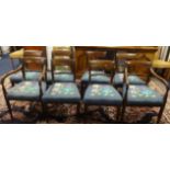 A set of eight mahogany framed Regency dining chairs with brass inlay, rope twist back rail and