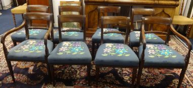 A set of eight mahogany framed Regency dining chairs with brass inlay, rope twist back rail and