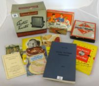 A collection of various items including 1950's swan toaster, Wren harmonica, old recipe books,