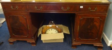 A reproduction mahogany pedestal partners desk approx, 152cm x 90cm x 77cm.