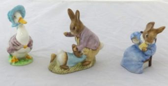 Beswick, three Beatrix Potter figures including Jemima Puddleduck and Cotton Tail (3).