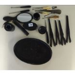 Ebony dressing table set and eleven assorted button hooks.