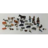 A collection of Dinky farmyard lead figures and diecast farmyard models including police car.