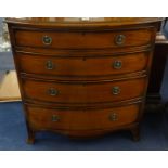A old reproduction bow fronted mahogany chest fitted with four long drawers on bracket feet, the top