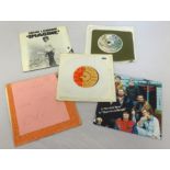 Original 45rpm vinyl records including John Lennon, T-Rex etc.
