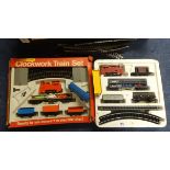 A Triang Hornby clockwork train set and another part set also a British Railways badge.