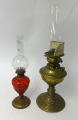 A pair of four drawer metal card cabinets, two oil lamps, another small oil lamp and a four piece