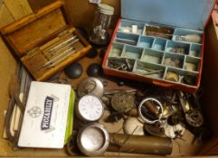 A collection of various watch parts and objects.