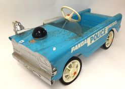A 1960's Triang police department pedal car.