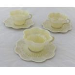 Belleek, three Irish porcelain cups and saucers with first period back stamp.