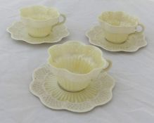 Belleek, three Irish porcelain cups and saucers with first period back stamp.