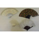 Collection of fans and combs including three ostrich feather fans.